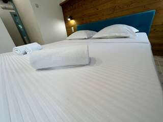 Гостиница Вилла Коронелло  Феодосия 3Х КОМНАТНЫЕ АПАРТАМЕНТЫ ( ДВЕ СПАЛЬНИ ПЛЮС ГОСТИНАЯ С КУХНЕЙ)-1